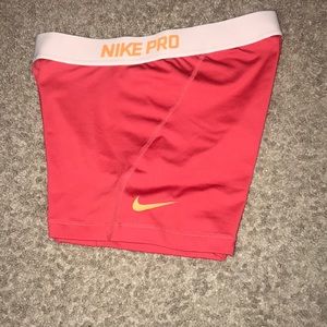 Nike Pro peach workout shorts